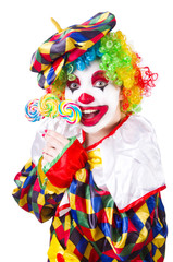 Clown with lollipops isolated on white