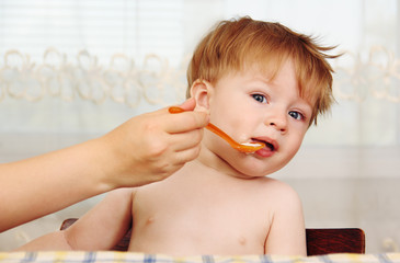 feeding a baby.