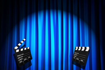 Movie clapper board against curtain