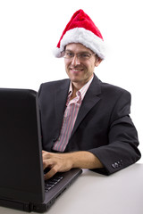 businessman celebrating Christmas by web chat on a computer
