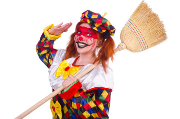 Clown with broom isolated on white