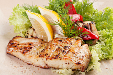 Grilled salmon with vegetables  with vegetables on the plate