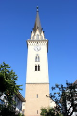 Fototapeta na wymiar Kirchturm der Stadtpfarrkirche St. Jakob in Villach in Kärnten