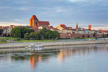 Torun old town reflected in Vistula river, Poland - obrazy, fototapety, plakaty