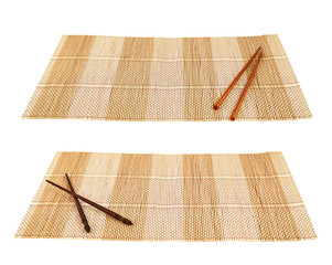 Chopsticks over a bamboo mat