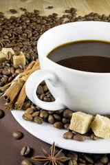 Coffee cup with cinnamon and sugar