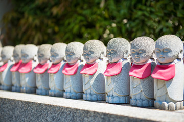 Rows of the small japanese Jizo statues
