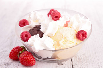 bowl of ice cream and berries