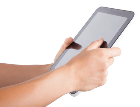 tablet in hands on an isolated