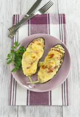 Eggplant baked with vegetables and cheese