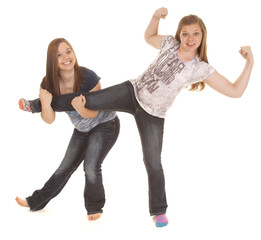 one girl holding another girls legs up