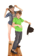 Fototapeta premium two kids cowboy hats posing