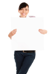 Beautiful young woman holding empty white board