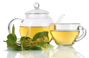 Kettle and cup of tea with linden