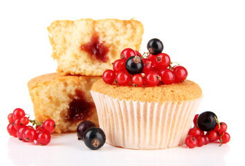 Tasty muffins with berries isolated on white