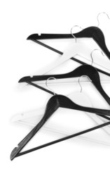 Black and white clothes hangers isolated on white
