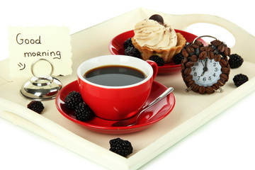 Cup of tea with cakes on wooden tray isolated on white