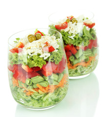 Tasty salad with fresh vegetables, isolated on white