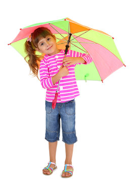 Little girl stands with umbrella isolated on white