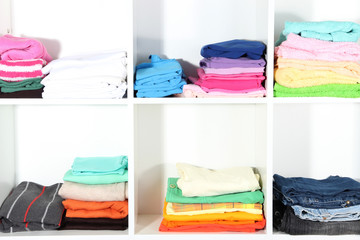 Clothes neatly folded on shelves