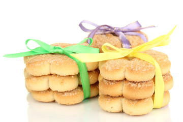 Sweet cookies tied with colorful ribbons isolated on white