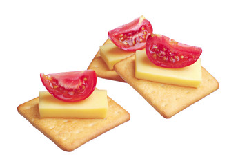 Crackers with cheese and tomato