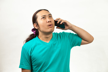 Fototapeta premium Asian man and mobile phone