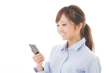 スマートフォンを見る女性　ビジネス