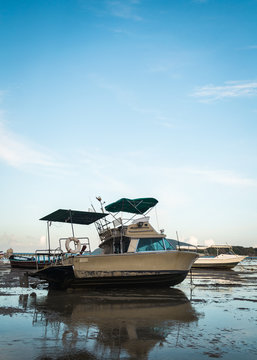 Motor Boat With Low Tide