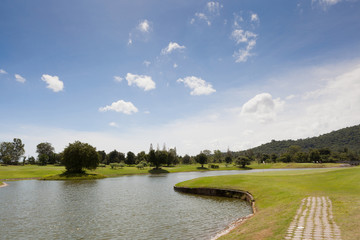 Fototapeta na wymiar Golf Course in Sunny Day Afternoon
