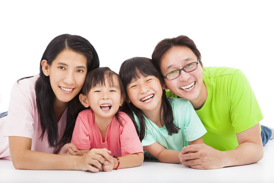 Happy  asian family isolated on white