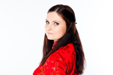 young and beautiful woman in a red Chinese dress