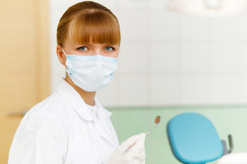 A portrait of a dental worker