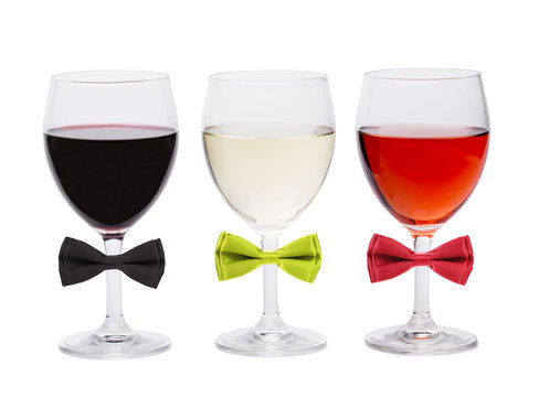 Three glasses of wine and bow tie.