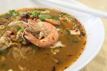 Tom Yam Koong soup with noodles