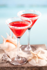 red drink on beach