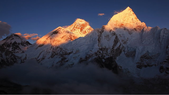 Golden peak of Mount Everest (8848 m)  on sunset.
