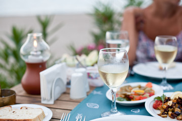 Romantic dinner with white wine.