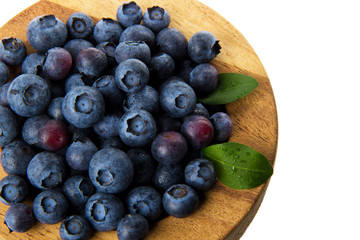 Blueberries in a wooden bowl