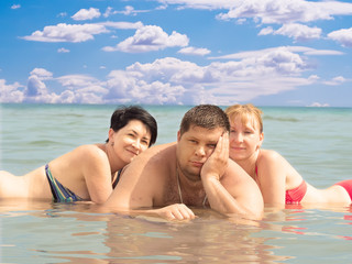 Fototapeta premium Young people on the beach