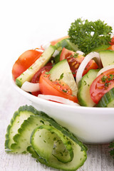 tomato salad with cucumber and parsley