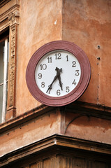 Fototapeta na wymiar Street clock in Rome, Italy