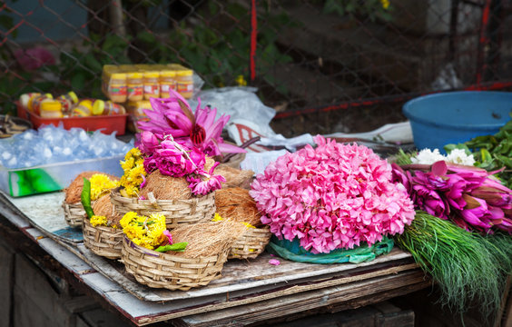 Flower and coconuts in India