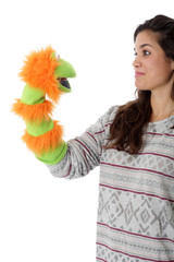 Model Released. Young Woman Holding a Glove Puppet
