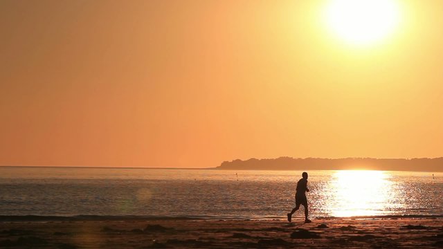 footing on the beah on sunset