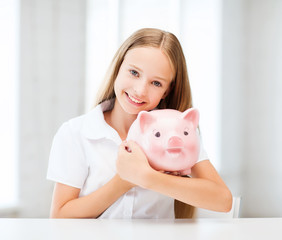 child with piggy bank