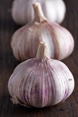 Garlic on a brown wooden table