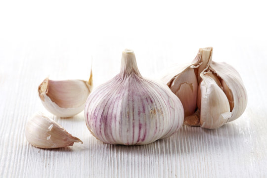 garlic on a white wooden table