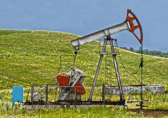 Fototapeta na wymiar Old rusty oil pump in mountain, with hight detalisation