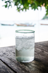 glass on table at the beach
